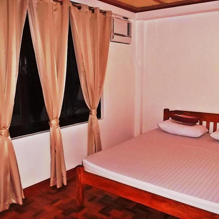 Balay De La Rama Bed & Breakfast Легаспи Номер фото